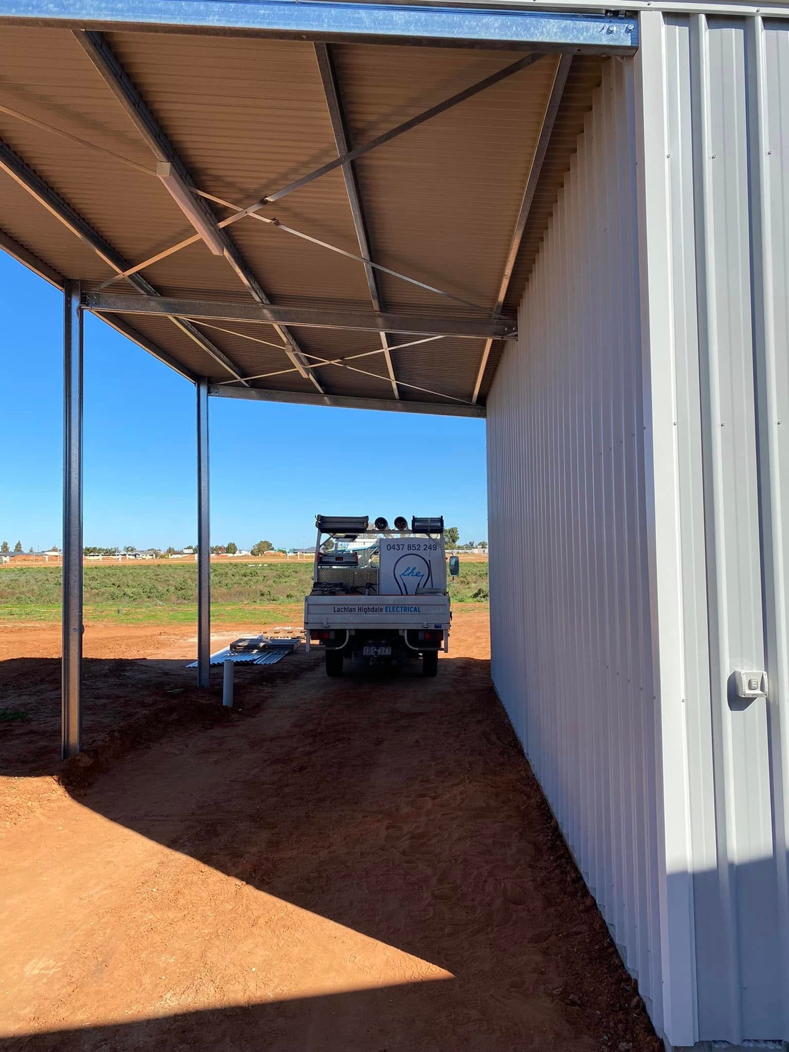 LHE Electrical work ute parked beside a newly wired shed
